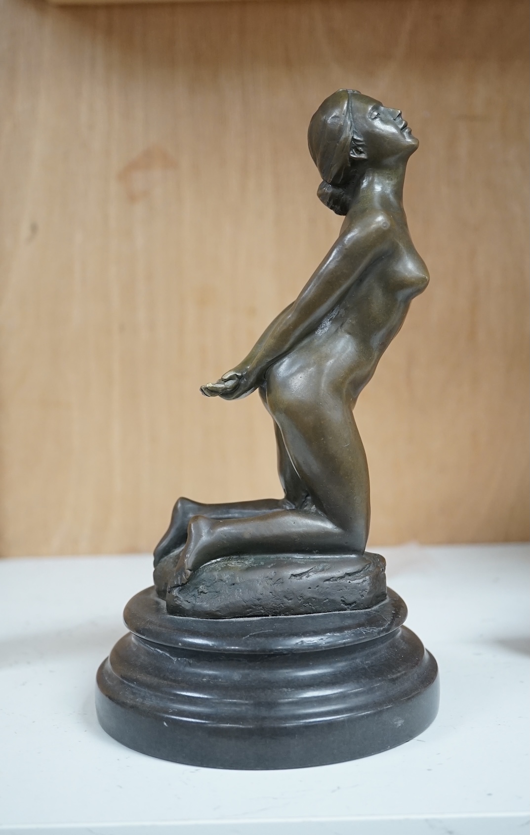 After Jean Patoue (1887 - 1936), a small bronze study of a bound nude lady, J.B. Deposse foundry mark, 21cm. Condition - base has crack around the entire diameter, possibly restored.